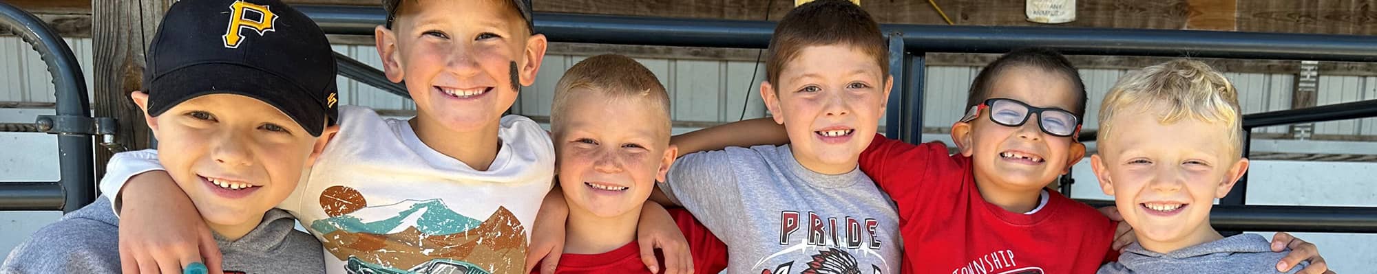 Six happy students smiling for the camera
