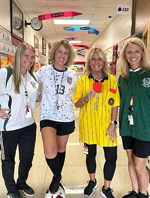 staff dressed as athletes