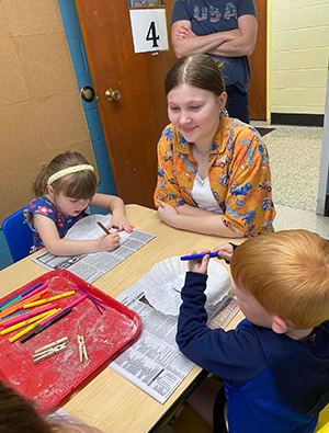 students sitting around a table