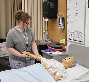 Female student in a medical training room