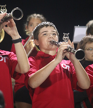 Students playing instruments in the band