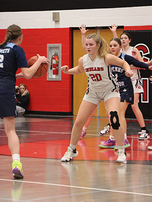 students playing basketball