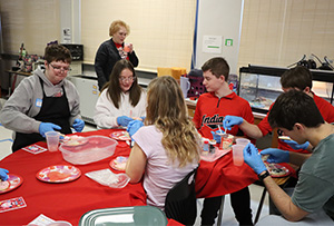 Group of students around a table