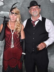 Lady smoking and man drinking