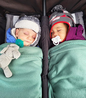 Two sweet students taking a nap outside
