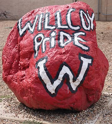 A painted rock that reads Willcox Pride W