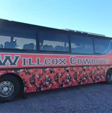 A bus that reads Willcox Cowboys