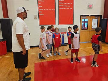 Students playing in the gym