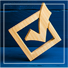 wooden check box on blue background