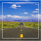 road leading to red mountains