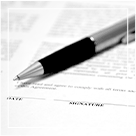 pen sitting on legal document