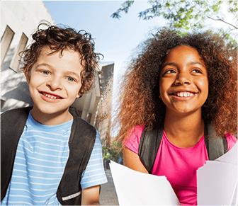 two students with backpacks