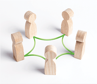 wooden blocks shaped like people in a network