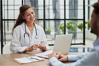 A doctor talking to a patient