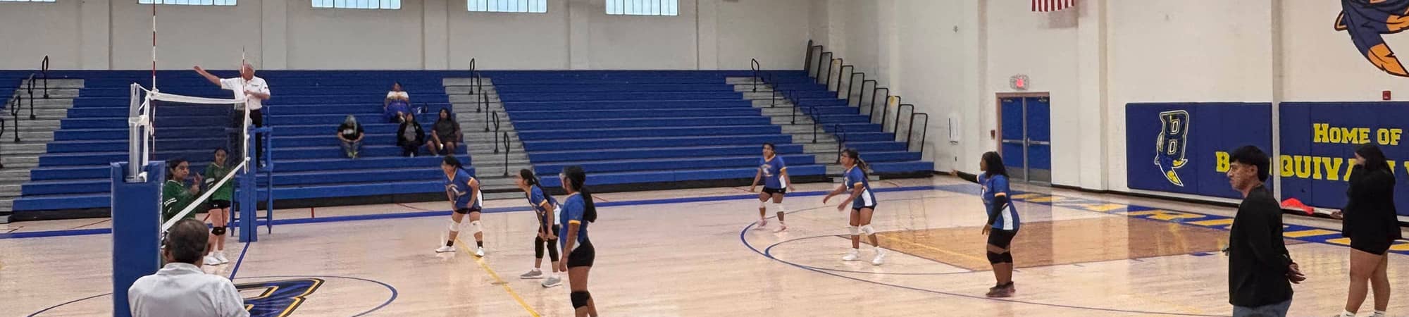 students playing volleyball