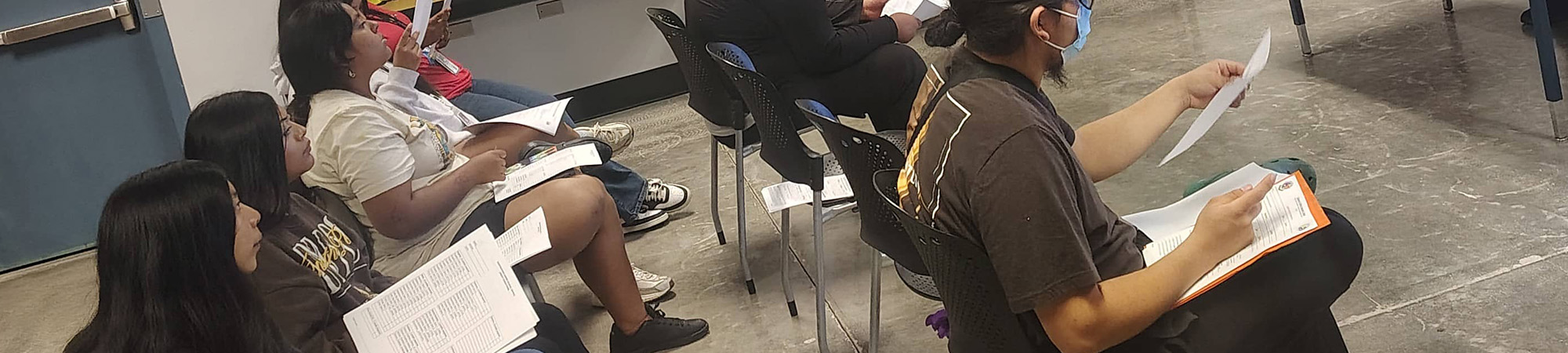 students sitting in chairs