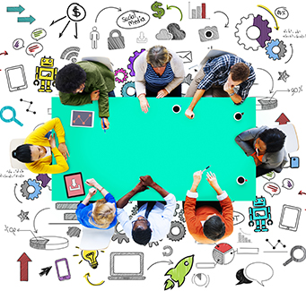 Staff members at a conference table