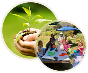 child holding plant in hands and students at a picnic table