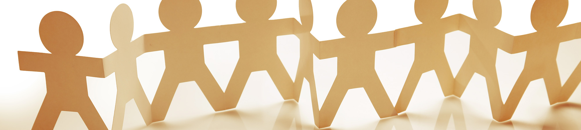 Teamwork concept with paper dolls