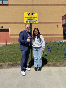 Principal with female student of the month for March 2026