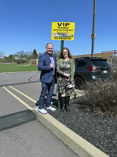 Principal outside with Mrs. Eckert - teacher of the month for March 2026