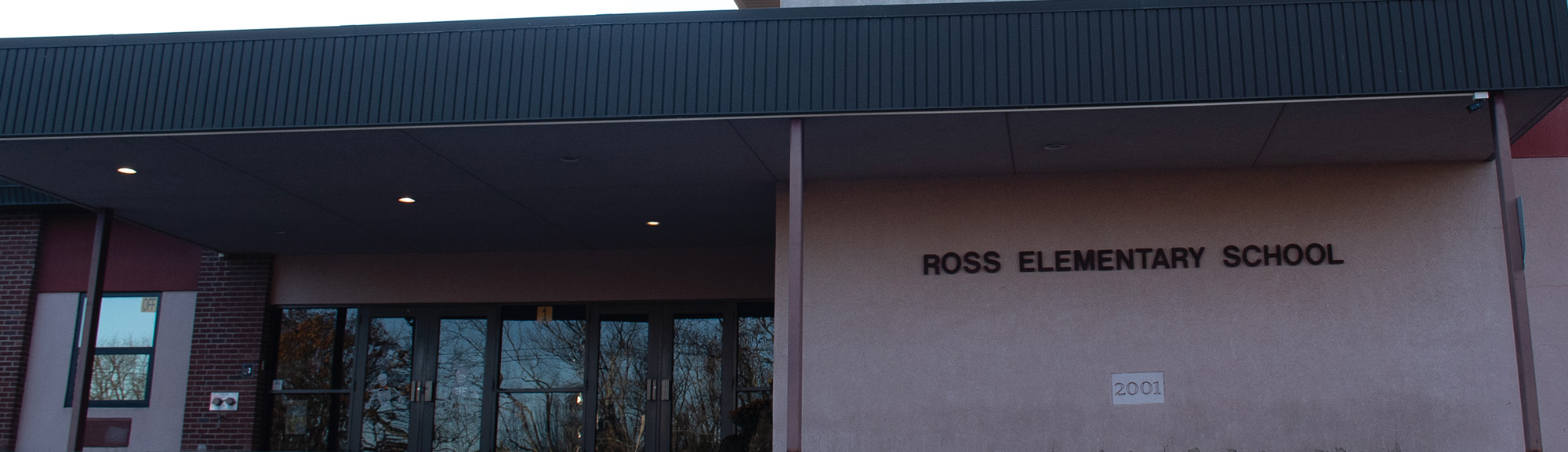 kids sitting on the floor listening to a story