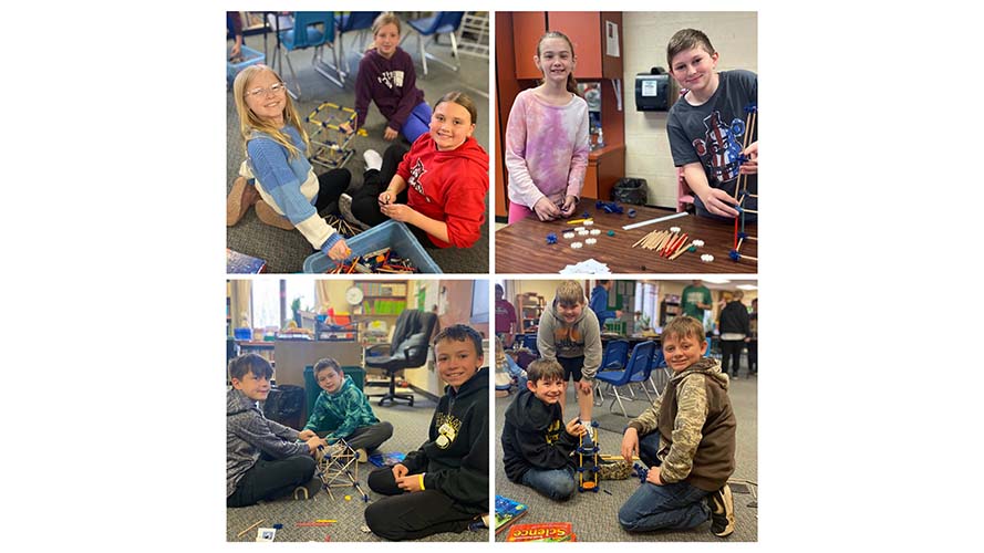 Students working on popsicle stick creations