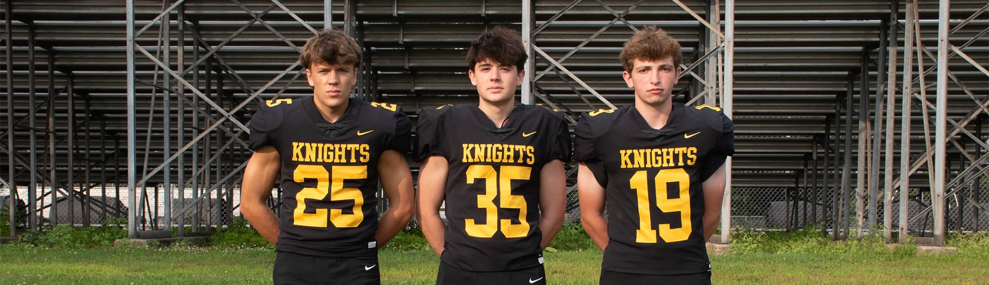 Three football players