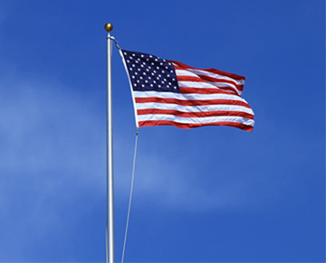 American flag against a blue sky