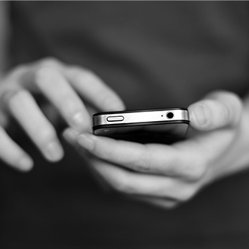 Pencils and a ruler on top of a stack of books