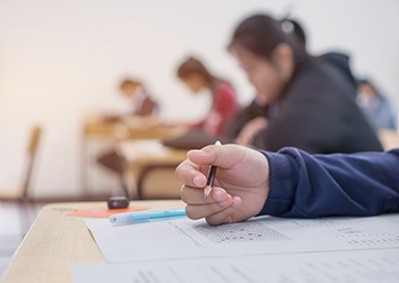 Students working at their desks in a classroom