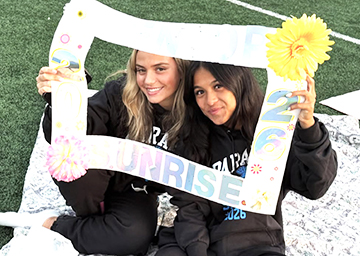 Two seniors at sunrise event