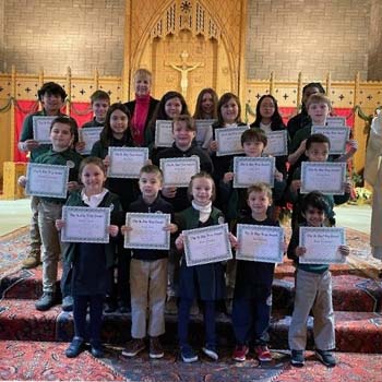 Students holding awards