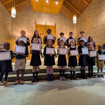 Student holding a diploma