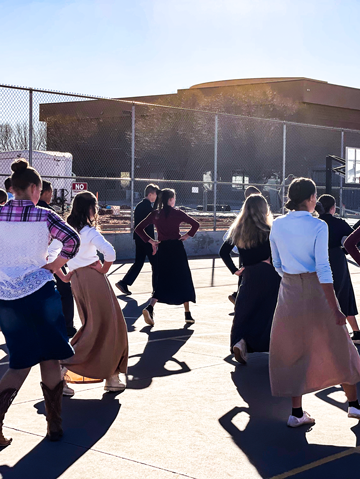 Students line dancing