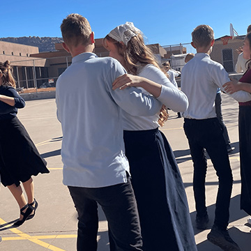 Students dancing together