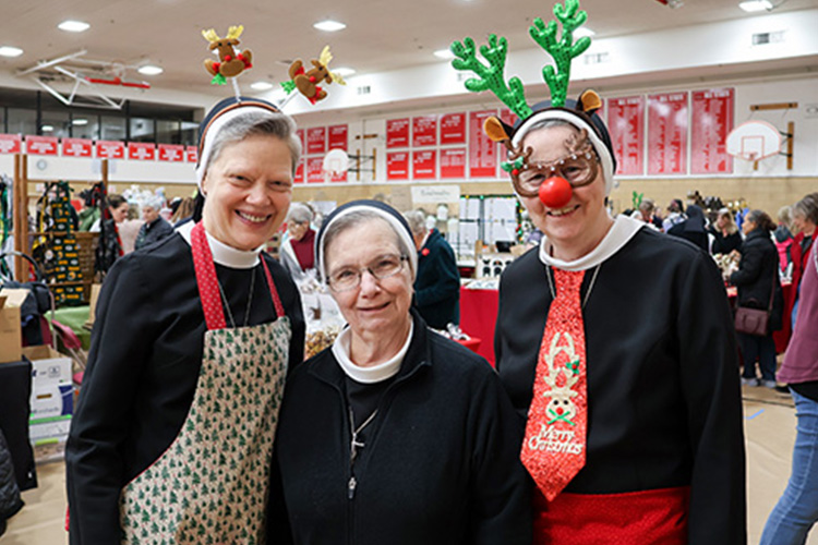 Three happy Sisters attending the Holly Berry event