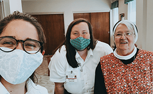 3 staff wearing masks