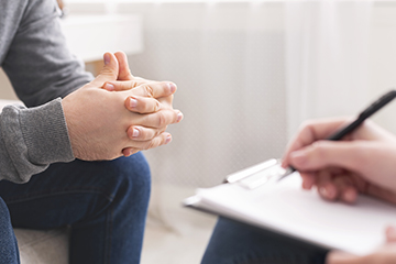 Student talking with a counselor