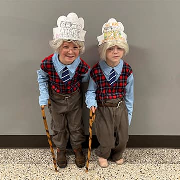 Two students dressed up as 100 years old