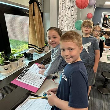 Students working on a project together in class