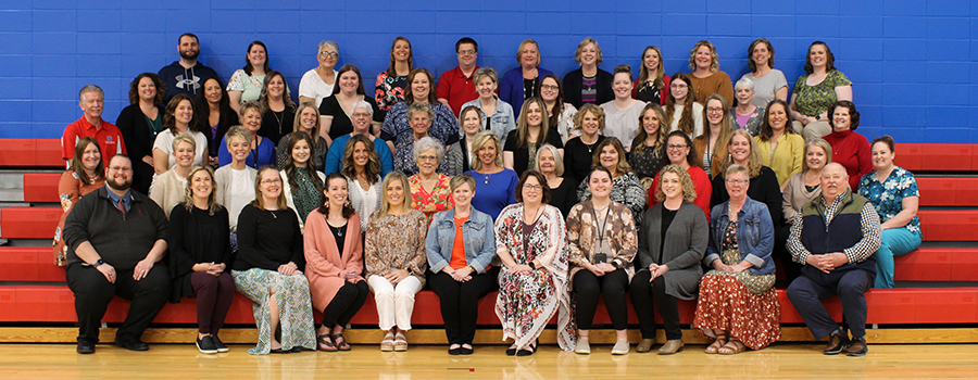 Staff group photo in the gym