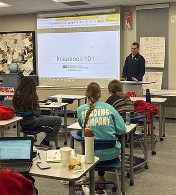 students learning about insurance