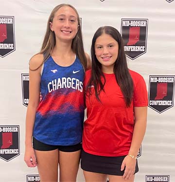 Two running athletes