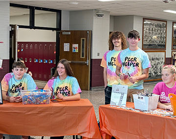 Group of students helping as Peer Helpers