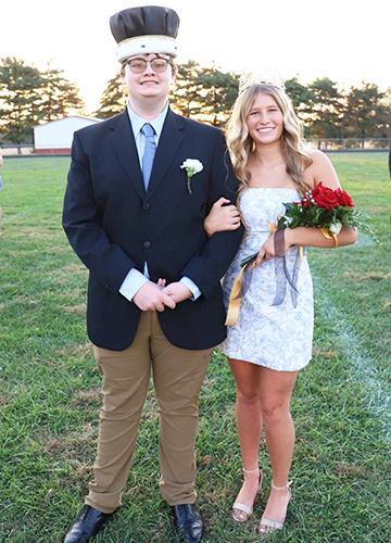 Homecoming King and Queen on the football field