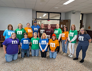 Staff members dressed up for Halloween