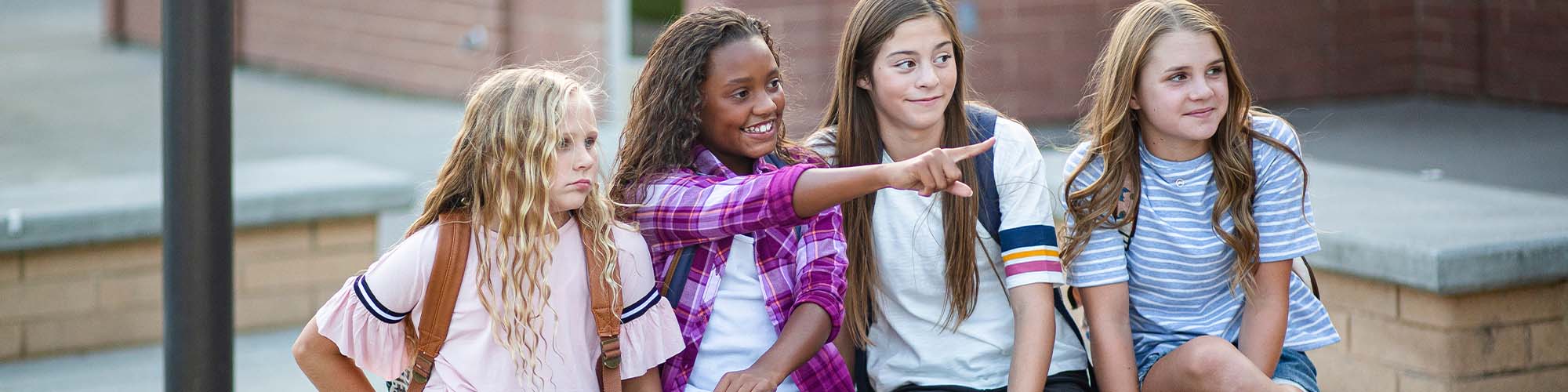 Four students sitting together