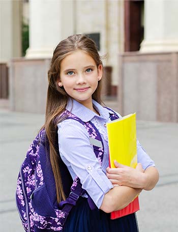Notebook on desk in the classroom Student with backpack