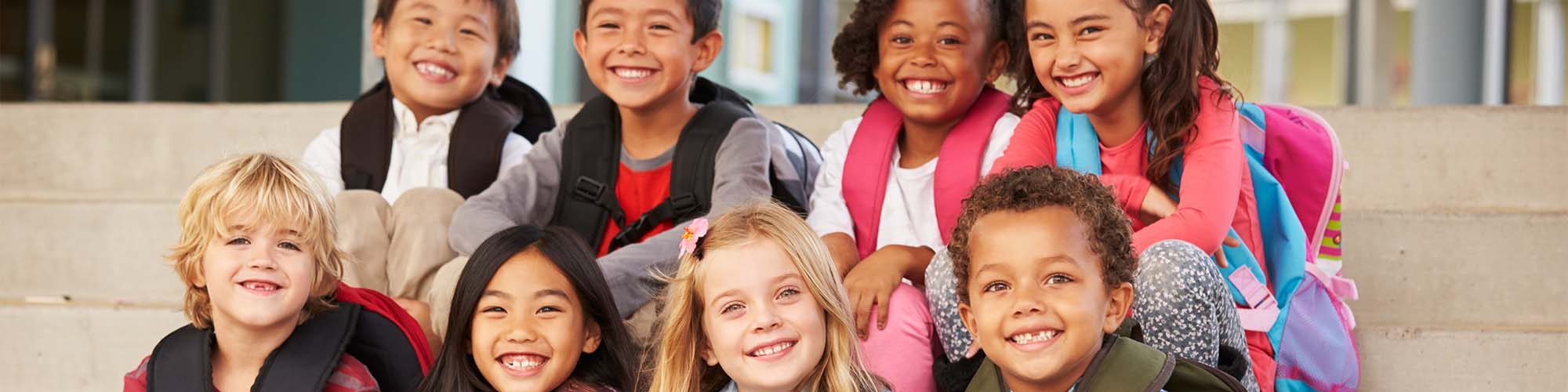 Students sitting on stairs together